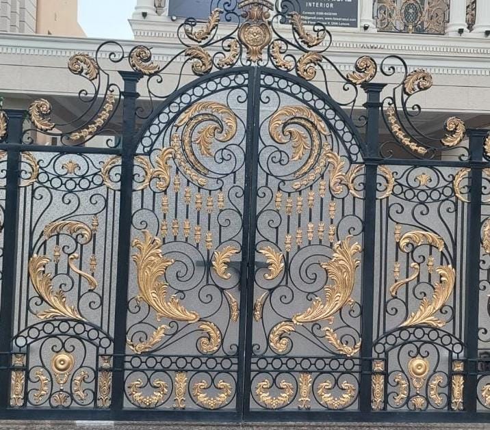 Handmade baroque wrought iron arched gate with acanthus scrollwork and gold accent detailing