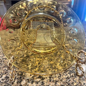 Amber colored Bicentennial plates, set of 4.  1776-1976