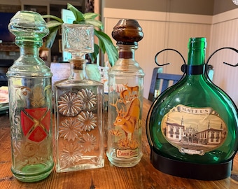 Vintage Decanter Set (4pc) – Four Roses Starburst, Cabin Still Deer, Emerald Etched Glass, Mateus Bottle – Lodge Bar Bundle