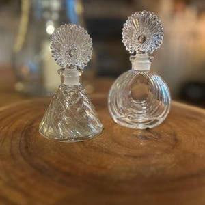 Set of 2 vintage pressed glass perfume bottles with glass stoppers