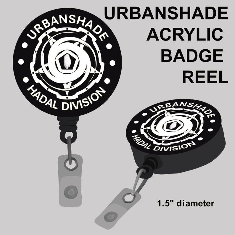 K&ouml;nnte beinhalten: Schwarzes und wei&szlig;es Acryl-Ausweis-Jojo mit dem Text "URBANSHADE ACRYLIC BADGE REEL" und "HADAL DIVISION". Das Jojo hat einen Durchmesser von 3,8 cm und ein einziehbares Kabel mit Clip.