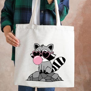 Raccoon cut file bundle, cute animal SVG, raccoon face PNG vector, raccoon silhouette cricut cut files, forest woodland SVG files, raccoon animal clipart for scrapbooking, raccoon design for mugs and shirts, animal wildlife SVG download, baby raccoon SVG PNG, forest critter SVG silhouette, raccoon digital cut file bundle, raccoon sticker cricut PNG SVG, forest nursery animal SVG, raccoon t-shirt sublimation design, raccoon svg for kids