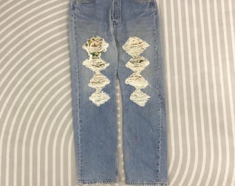 Vintage Levi's 501 made in USA rare design Distressed patchwork Denim pants