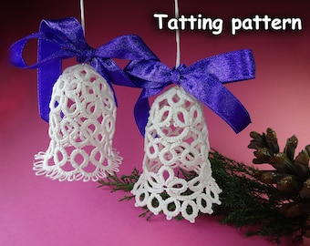 May include: Two white, bell-shaped tatting ornaments with intricate lace patterns are suspended by white strings. Each bell is adorned with a vibrant purple satin bow. The text "Tatting pattern" is displayed in the upper right corner.