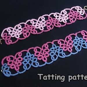 May include: Two crocheted bracelets with a floral pattern in pink, blue, and purple. The bracelets are made with a tatting technique and have a toggle clasp.