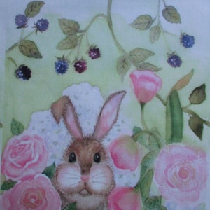 May include: A watercolor painting of a brown bunny surrounded by pink roses and peaches. The bunny has long ears and a fluffy face. Dark purple blackberries and green leaves are scattered throughout the background.