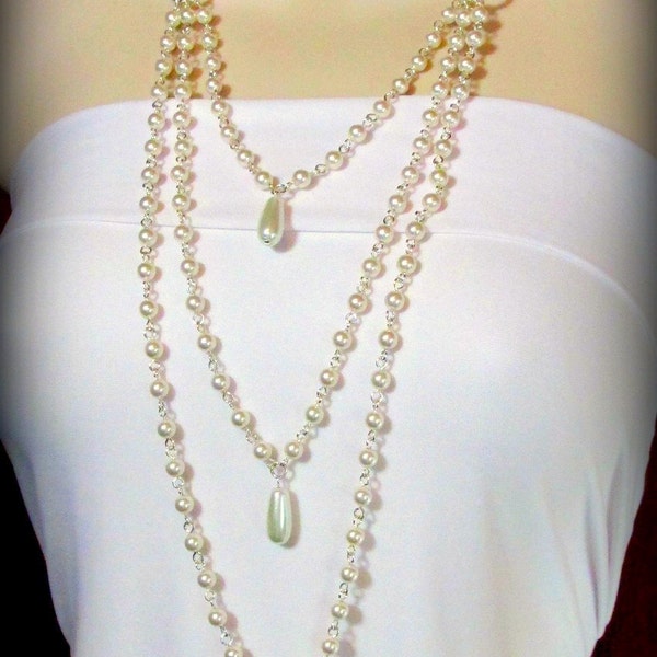 Necklace - Long, Elegant Strands of Pearls with Teardrops.