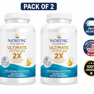 May include: Two white bottles of Nordic Naturals Ultimate Omega 2X fish oil supplements. Each bottle contains 180 soft gels and features a lemon illustration. The label highlights high-strength omega-3s for heart, brain, and immune health.