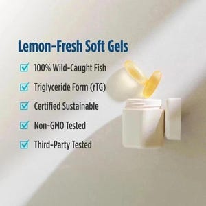 May include: A white bottle with a lid next to it, containing two yellow soft gels. The text reads "Lemon-Fresh Soft Gels" and lists features including "100% Wild-Caught Fish" and "Non-GMO Tested".