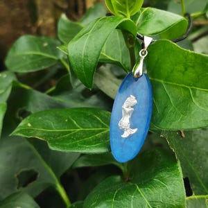 Necklace with resin pendant, navy blue and silver colored mermaid