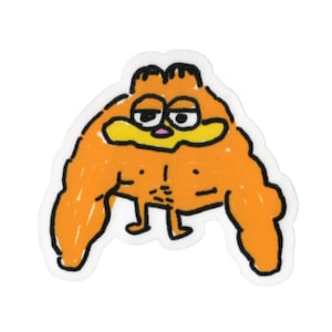 May include: Orange cartoon sticker of Garfield with a muscular physique. The sticker features Garfield's face with his signature expression, a yellow mustache, and black outlines. The body is orange with black outlines.