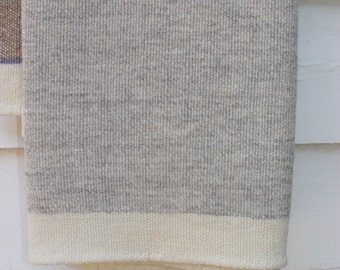 Merino wool baby blanket hand woven by Dianne Nordt