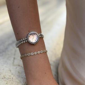 Pearl Strap Pink Dial Stone Watch