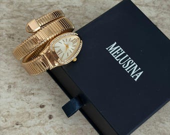 Gold-Toned Zircon-Studded Snake-Shaped Watch With a White Dial