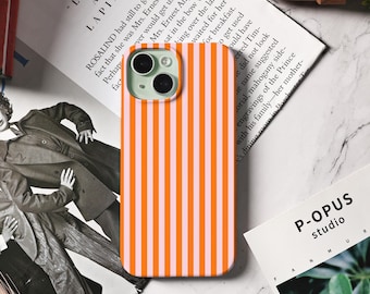 May include: Orange and white striped phone case. The case is a vibrant orange with vertical white stripes. The phone case is on top of a book with the text "VIRGINI WOOLF - LAPPIN AND LAPINOVA".