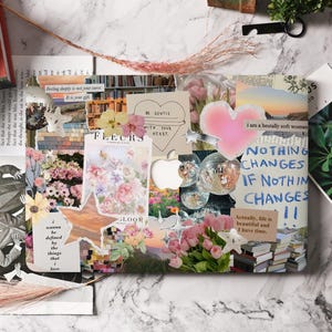 May include: A collage of images and text on a laptop. The collage includes flowers, a heart, a disco ball, and text that says "Nothing changes if nothing changes".