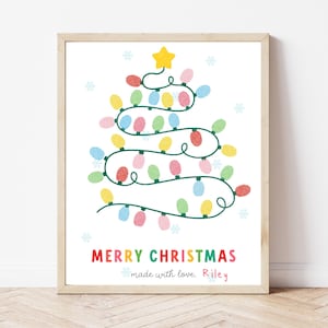 May include: A framed print featuring a whimsical Christmas tree design. The tree is composed of colorful lights in red, yellow, green, and pink, topped with a yellow star. The words "MERRY CHRISTMAS" are displayed below, with "made with love, Riley" underneath.