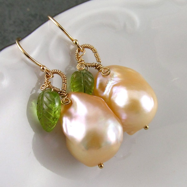 Peach baroque pearl earrings, handmade with peridot leaves, solid 14k gold earrings-OOAK June birthstone-Maryhill