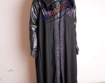 May include: A full-length black hooded robe with intricate purple embroidery down the front and on the sleeves. The robe has a high collar and is paired with black gloves. The image includes the text "FALAKSHER AUTO TOY".