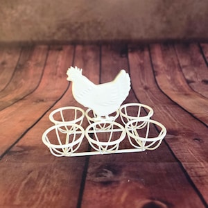 White metal egg basket for 6 eggs