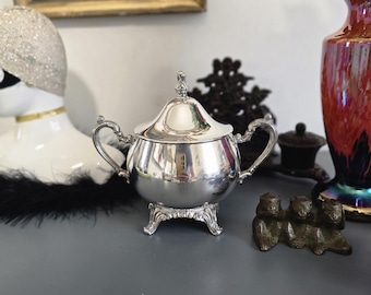 Orbrille silver plated sugar bowl with lid and ornate feet