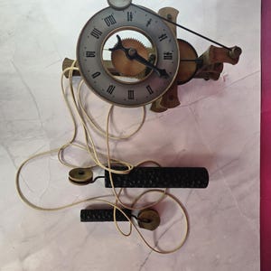 Buco schweizisk träklocka, vintage väggskelett mekanisk klocka