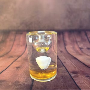 Glass seashell paperweight, decorative oil lamp without wick