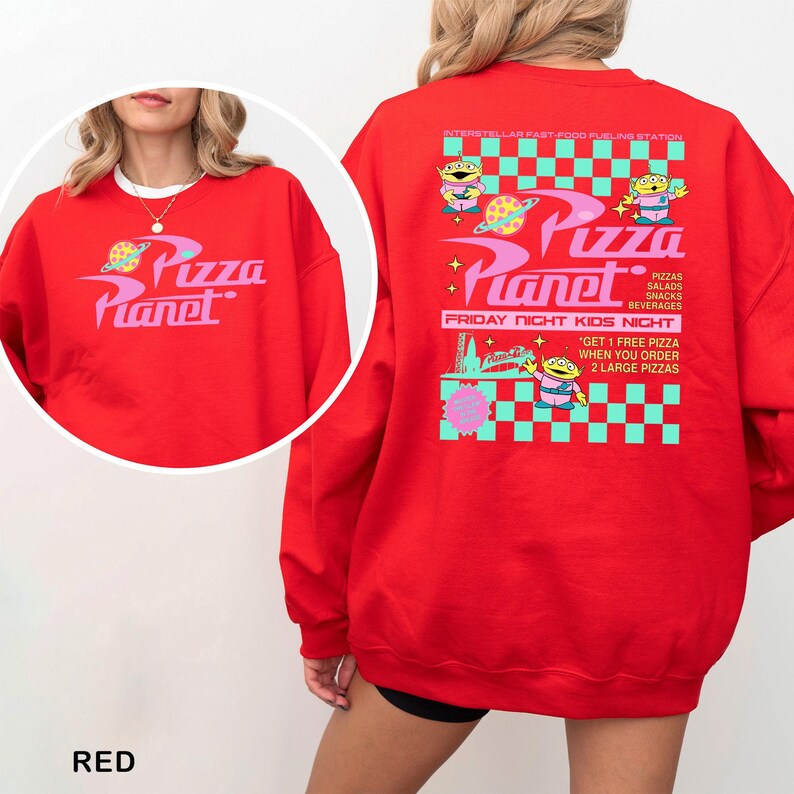 A red sweatshirt with a colorful design featuring characters from the movie "Pizza Planet".