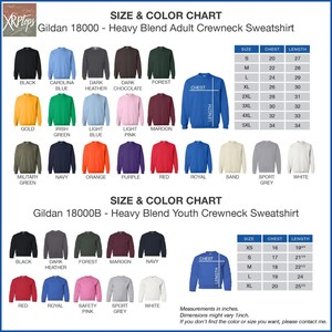 The image is a size and color chart for a Gildan 180000 - Heavy Blend Adult Crewneck Sweatshirt. It displays a variety of different colored shirts, including black, blue, green, orange, purple, red, royal, and grey, along with their corresponding chest and sleeve measurements. The chart provides a visual representation of the different sizes available for the shirt, allowing customers to easily choose the color and size that best fits their preferences.