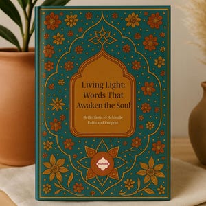 May include: A hardcover book titled "Living Light: Words That Awaken the Soul." The cover is teal with gold and orange floral designs. The book's title is in a gold arched frame. The book is on a beige cloth.
