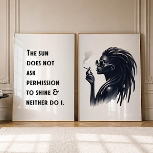 May include: Two framed wall art prints. The left print features the black text: The sun DOES NOT ASK PERMISSION TO SHINE & NEITHER DO I. The right print shows a black and white illustration of a person with dreadlocks wearing round sunglasses.