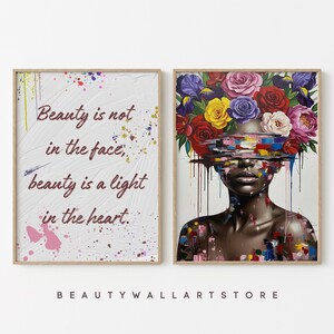 May include: Two framed art prints. One features the text "Beauty is not in the face, beauty is a light in the heart" with colourful paint splatters. The other depicts a woman with a floral headdress and colourful paint streaks.