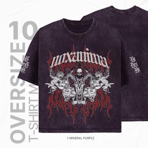 May include: Oversized t-shirt in mineral purple with a graphic print of a skull with horns, surrounded by angels and the text "maxxima". The text "hell wait for you" is also printed on the shirt.