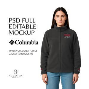 May include: A dark gray unisex Columbia fleece jacket with a full zip closure. The jacket has the text "YOUR DESIGN HERE" embroidered on the chest. The image also includes the text "PSD FULL EDITABLE MOCKUP" and "UNISEX COLUMBIA FLEECE JACKET (EMBROIDERY)".