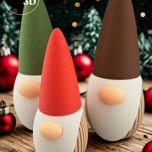 May include: Three whimsical gnome figurines with textured green, red, and brown conical hats. Each gnome has a white beard, a tan nose, and a wooden-like body. The background includes Christmas ornaments and greenery, with the text "Selwyn 3D".