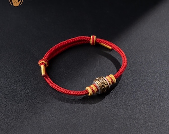 Handvävt rött snörearmband med roterande Pixiu-pärla, talisman för att attrahera rikedom och skydda, justerbar
