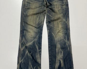 Jeansy Vintage Edwin Blue Trip 503 z przetarciami w pasie, 32 cale