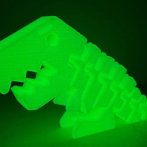 Flexi-Rexi - The Adorable Flexible T-Rex Dinosaur Fidget in Rainbow, Sparkle, Glow-in-the-Dark, Black Silk