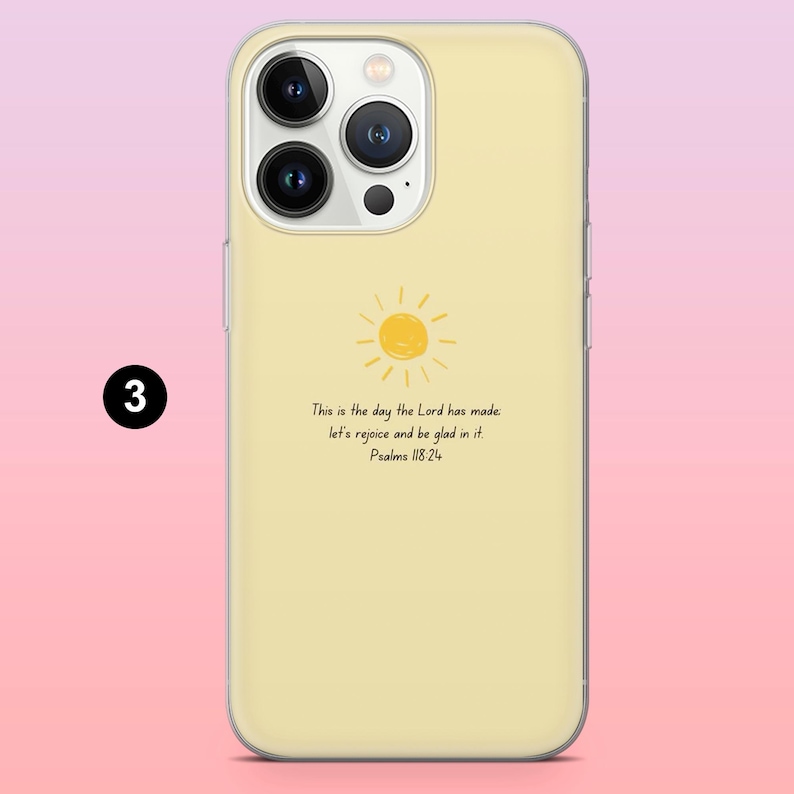 May include: A light yellow phone case with a sun illustration and the text "This is the day the Lord has made. Let's rejoice and be glad in it. Psalms 118:24."