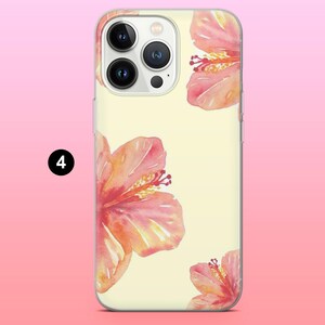 May include: A clear phone case featuring a watercolor design of pink and orange hibiscus flowers on a pale yellow background. The case has a glossy finish and a camera cutout. The number 4 is in a black circle in the corner.