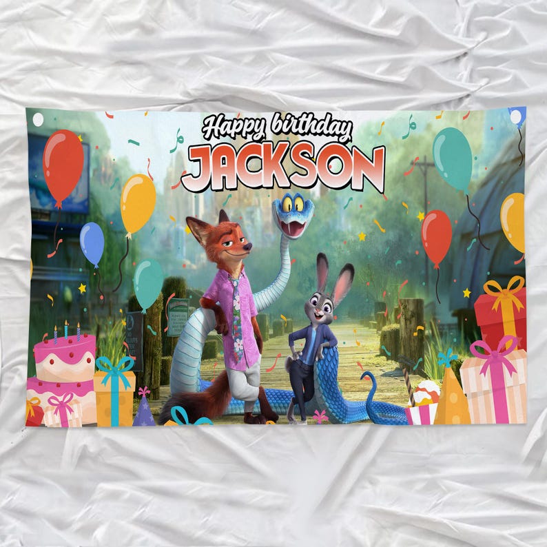 May include: A birthday banner with Zootopia characters and the text "Happy birthday JACKSON". The banner features a fox, a rabbit, and a snake, along with balloons, gifts, and a cake. The background depicts a bridge and trees.