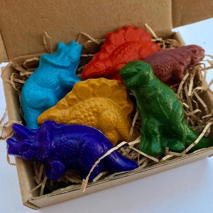 dinosaur crayons set of six dinosaur soy crayons in a box with organic paper shred with colors green orange yellow purple turquoise red