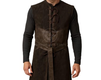 May include: A brown leather vest with a long, pointed collar and a belt. The vest has a lace-up front and a contrasting panel of leather across the chest.