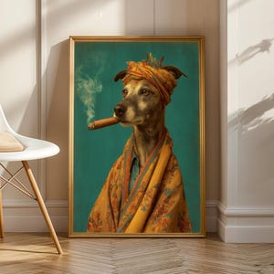 May include: A framed wall art print featuring a portrait of a dog wearing a patterned orange turban and a matching floral shawl, with a cigar in its mouth emitting a trail of smoke against a solid teal background, encased in a gold frame.