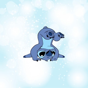 May include: A cartoon illustration of Stitch, a blue extraterrestrial creature, in a playful pose. Stitch is upside down with his arms and legs extended, showcasing his large eyes and distinctive features against a light blue background with white bokeh.