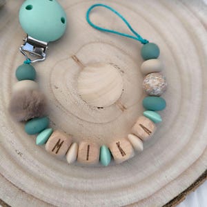 Pacifier chain personalized with name wood and silicone beads including gift bag with desired text as print