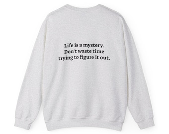 Sudadera unisex de cuello redondo de mezcla pesada "La vida es un misterio"