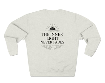 Sudadera unisex de cuello redondo "La luz interior nunca se desvanece", regalo acogedor, ropa motivacional, sudadera de yoga, ropa de atención plena.