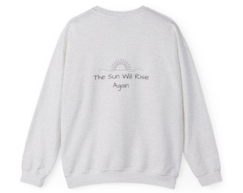 Sudadera unisex de cuello redondo de mezcla pesada The Sun Will Rise Again™