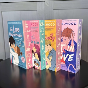 May include: A collection of four hardcover books with colorful covers. The titles include "The Love Hypothesis", "The Brain", "Practically", and "In Love". Each book features illustrations of people and scientific symbols.